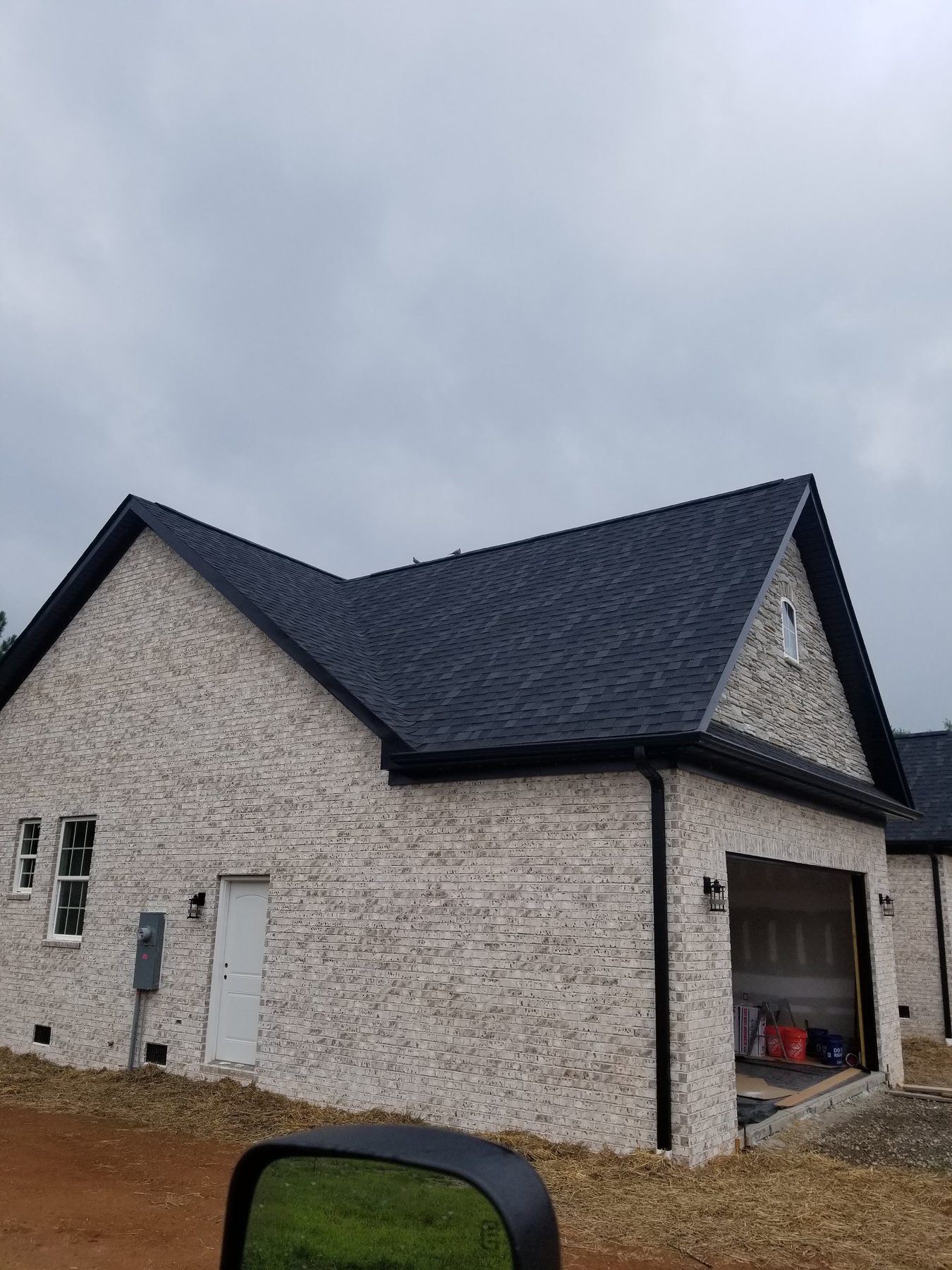 Completed white brick home built by Tessco Construction in Spartanburg County